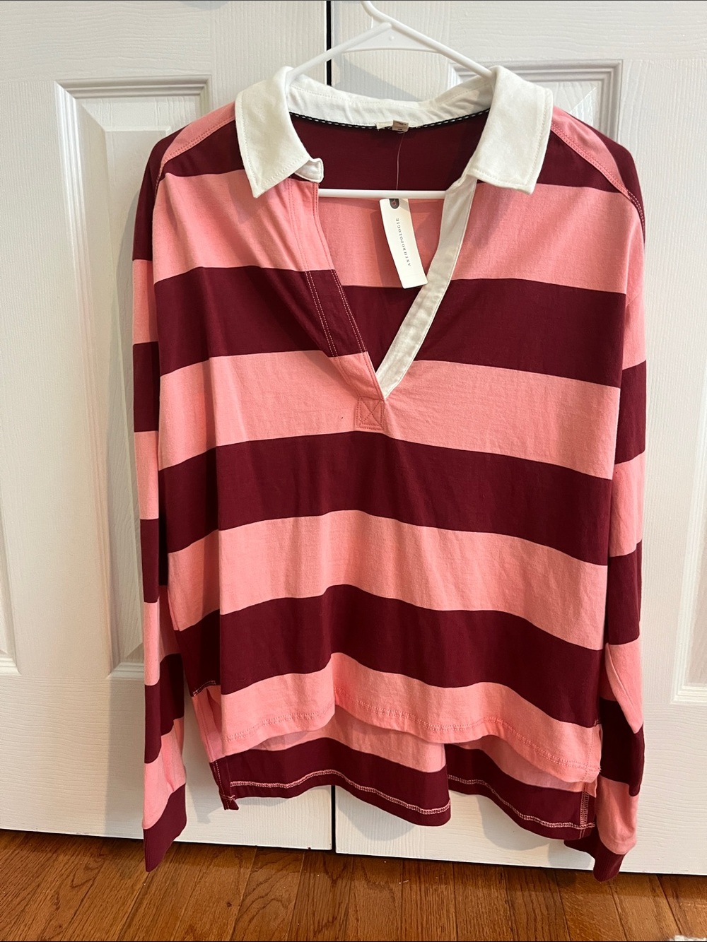 Pink and burgundy horizontal striped rugby shirt